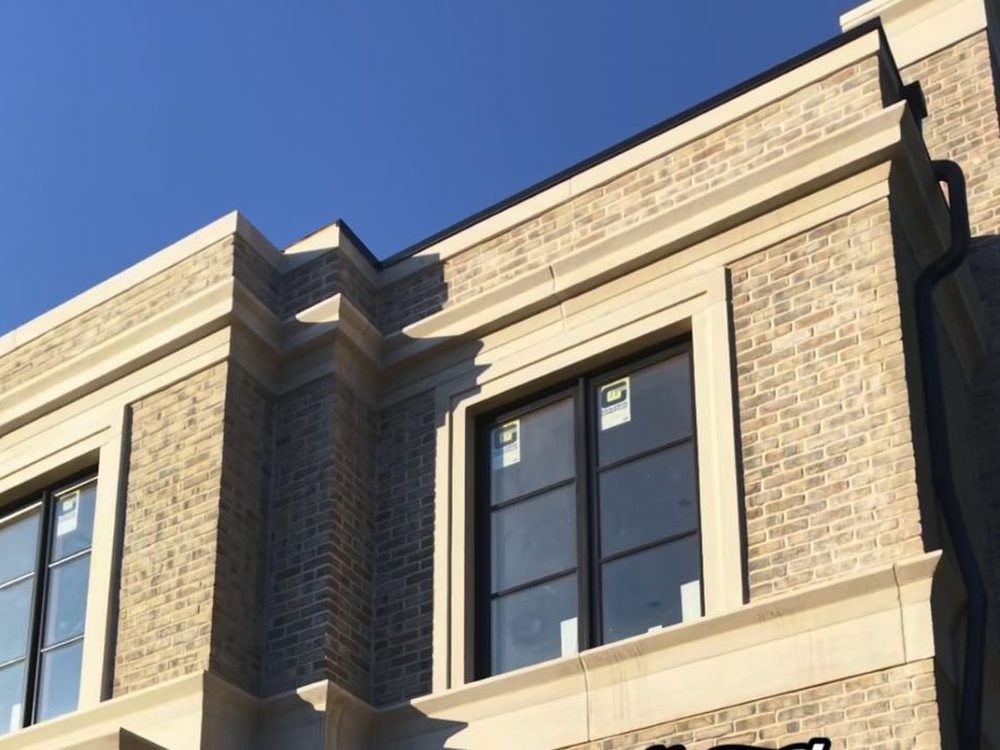 Limestone and precast detail on the Transitional Manor on Noblewood
